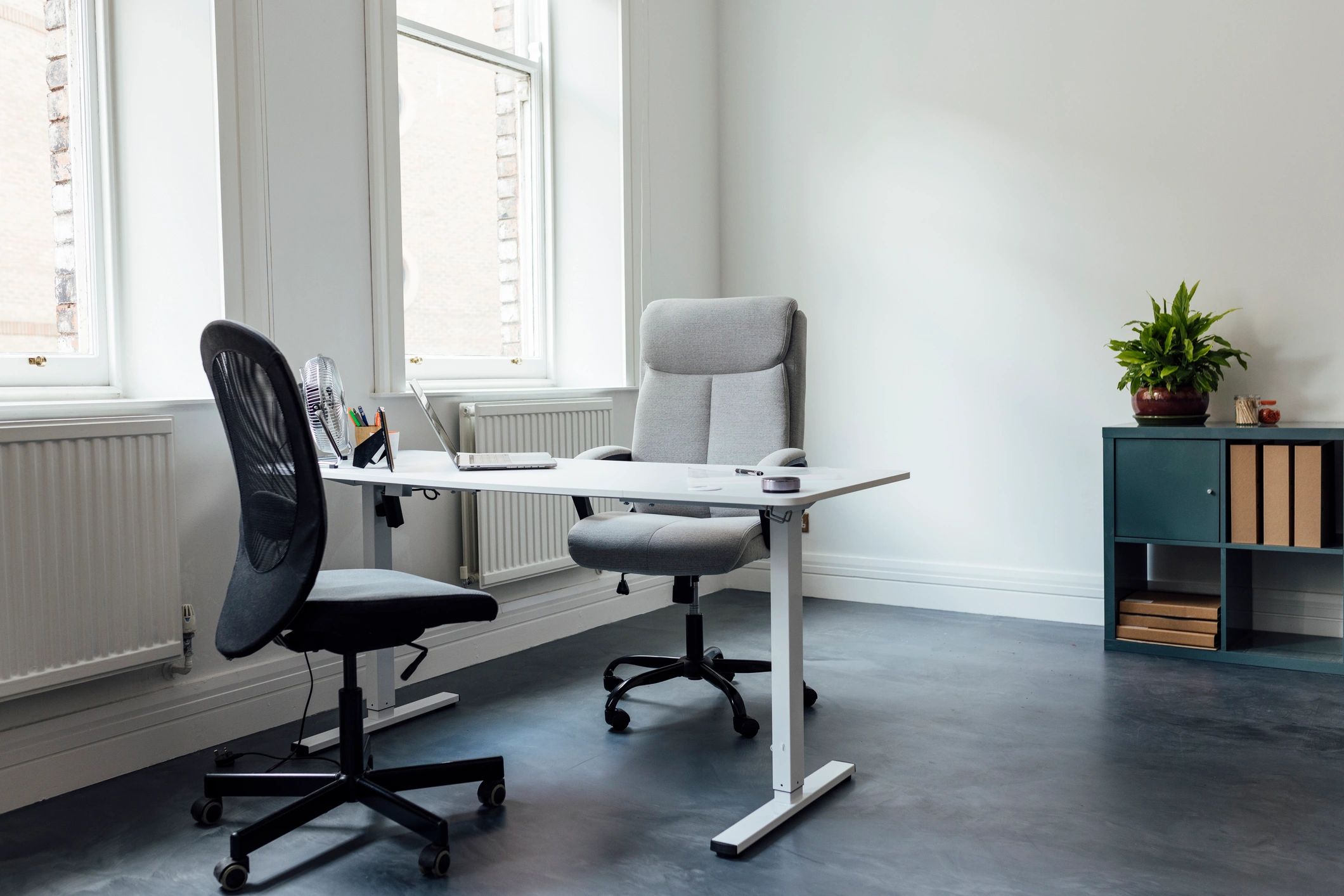 Professional coaching office with writing desk